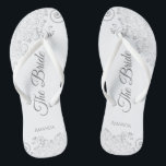 Silver Lace on White Elegant The Bride Wedding Thongs<br><div class="desc">Dance the night away with these beautiful wedding flip flops. Designed for the bride, they feature a simple yet elegant design with grey script lettering on a white background and fancy silver grey lace curls and swirls. Beautiful way to stay fancy and appropriate while giving your feet a break after...</div>