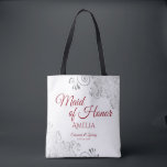 Silver Lace Red & White Maid of Honour Wedding Tote Bag<br><div class="desc">This beautiful tote bag is designed as a gift, favour, or swag bag for your wedding Maid of Honour. The simple yet elegant design features ornate silver grey lace frills in the corners with fancy script lettering. There is space for her name, as well as the names of the couple...</div>