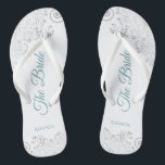 Silver Lace & Teal on White The Bride Wedding Thongs<br><div class="desc">Dance the night away with these beautiful wedding flip flops. Designed for the bride, they feature a simple yet elegant design with teal or turquoise coloured script lettering on a white background and fancy silver grey lace curls and swirls. Beautiful way to stay fancy and appropriate while giving your feet...</div>