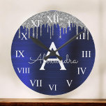 Silver Navy Blue Glitter Brushed Metal Monogram Round Clock<br><div class="desc">Silver and Navy Blue Faux Foil Metallic Sparkle Glitter Brushed Metal Monogram Name and Initial Luxury Wall Clock. This makes the perfect sweet 16 birthday,  wedding,  bridal shower,  anniversary,  baby shower or bachelorette party gift for someone that loves glam luxury and chic styles.</div>