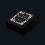 Silver Pink Frame Granddaughter Personalised Gift Box<br><div class="desc">This pretty gift box is appropriate for a granddaughter or a daughter. An ornate silver frame embellished with pink jewel images forms a circular middle for your custom text in silver. The image and the text are placed on a dramatic black background. Very elegant, personalised, and a keepsake she will...</div>