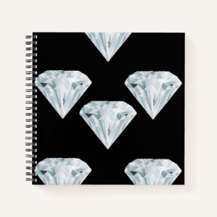 Silver shiny diamonds on black notebook