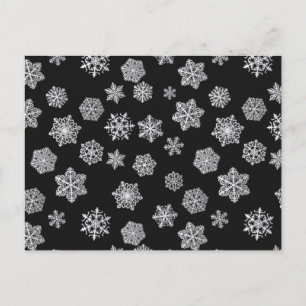 Silver snowflakes on a black background postcard