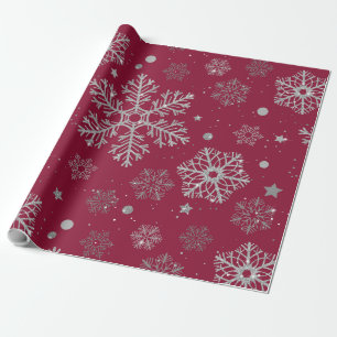 Silver snowflakes on dark red wrapping paper