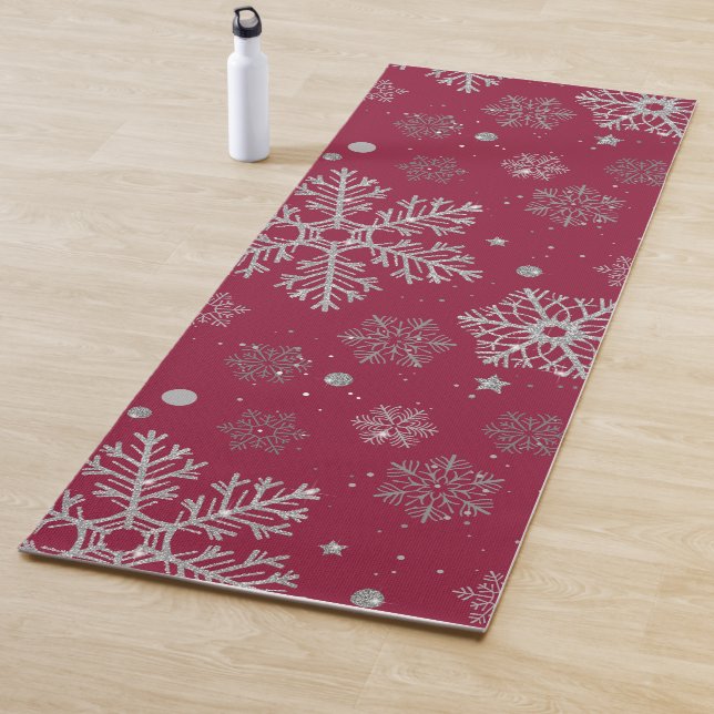 Silver snowflakes on dark red yoga mat (In Situ)