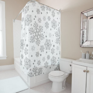 Silver snowflakes on white shower curtain