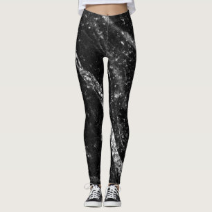 Silver sparkly line on black rock abstract leggings