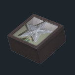 Silver Star Premium Gift Box<br><div class="desc">Stone d’or Photos presents Silver Star that is worth at least a thousand golden words. Celebrate Christmas with this pretty Silver Star that would be proud to top any tree as it lights the way to Christ's Manger. Featured on a variety of products including mugs, postage, buttons, keychain, bags, coasters,...</div>