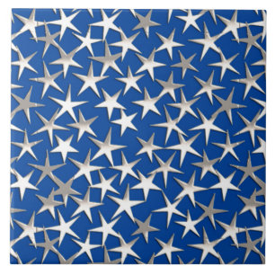 Silver stars on cobalt blue ceramic tile