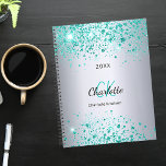 Silver teal glitter name monogram 2024 planner<br><div class="desc">A faux silver metallic looking background decorated with teal,  sea green faux glitter dust. Personalise and add your first name,  monogram initials,  full name and a year.</div>