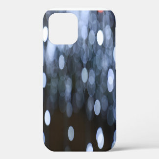 Silver, white bokeh night background. iPhone 12 case