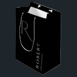 Simple Black Monogram Personalised Groomsmen Mediu Medium Gift Bag<br><div class="desc">This black personalised groomsmen gift bag features personalised groomsman's name,  and calligraphy monogram in grey colour. Change background and fonts colours easily if you like.</div>