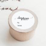 Simple Black & White Calligraphy Christmas Name Classic Round Sticker<br><div class="desc">These simple black and white calligraphy christmas name stickers are the perfect labels for a rustic holiday gift. The neutral design features an elegant brush script font which reads "christmas wishes" and a small christmas tree. Handwrite the name of the gift recipient and gift giver on the printed stickers. Please...</div>