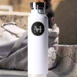 Simple Black white Monogram custom Water Bottle<br><div class="desc">Elevate your gift-giving with this Simple Black & White Monogram Custom WATER BOTTLE. Designed with a clean, minimalist aesthetic, this water bottle features a bold monogram in classic black and white. Perfect for gifts, wedding favours, or as a personalised everyday accessory. Add your initials or someone special's to create a...</div>