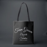 Simple Black & White Team Groom Wedding Tote Bag<br><div class="desc">These "team groom" tote bags are designed as favours or gifts for groomsmen,  family,  or other members of the wedding party. Great swag bag to fill with favours and gifts. Simple design includes white script text over a black background.</div>