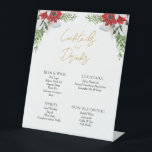 Simple Classic Christmas Wedding Drinks Bar Sign<br><div class="desc">This simple classic Christmas wedding drinks bar sign features a clean, bright white backdrop with simple, minimalist black and gold lettering and handwritten calligraphy accents. Embellishments of beautiful and classic green and red Christmas wreaths with delicate gold features create a perfect winter holiday aesthetic while maintaining a polished elegance for...</div>