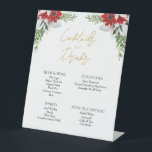 Simple Classic Christmas Wedding Drinks Bar Sign<br><div class="desc">This simple classic Christmas wedding drinks bar sign features a clean, bright white backdrop with simple, minimalist black and gold lettering and handwritten calligraphy accents. Embellishments of beautiful and classic green and red Christmas wreaths with delicate gold features create a perfect winter holiday aesthetic while maintaining a polished elegance for...</div>