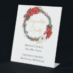 Simple Classic Christmas Wedding Signature Drinks Pedestal Sign<br><div class="desc">This simple classic Christmas wedding signature drinks pedestal sign features a clean, bright white backdrop with simple, minimalist black and gold lettering and handwritten calligraphy accents. Embellishments of beautiful and classic green and red Christmas wreaths with delicate gold features create a perfect winter holiday aesthetic while maintaining a polished elegance...</div>