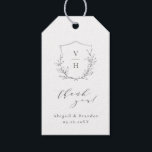 Simple elegance botanical crest monogram wedding gift tags<br><div class="desc">Monogrammed initials framed by elegant crest and hand illustrated botanical leaves,  and elegant script and classic font in black and white,  simple and luxury.  Great thank you favour stickers for modern classic wedding,  simple formal wedding,  elegant botanical garden wedding. 
See all the matching pieces in the collection.</div>