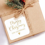 Simple Gold Merry Christmas Calligraphy Script Square Sticker<br><div class="desc">An elegant gold Merry Christmas Sticker with pretty script typography. Personalise it with your name. Designed for you by Blackberry Boulevard.</div>