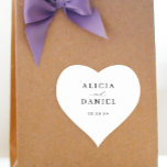 Simple minimalist elegant wedding favour label<br><div class="desc">Elegant simple minimal wedding favour gift heart shape sticker featuring a classy stylish chic trendy calligraphy script. Easy to personalise with your details! Suitable for formal neutral theme weddings. Please note that the background colour can be changed to match your wedding colour scheme. If comfortable doing it, you can change...</div>