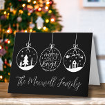 Simple Modern Black White Family Christmas Holiday Card<br><div class="desc">Personalised Custom Simple Modern Black And White Script Merry And Bright Holiday Christmas Card. A perfect Christmas card for either personal (family name) or business use. Features 3 ornaments, one with 'Merry And Bright' in the centre. The other two have winter scenes like a Christmas Tree and Santa and the...</div>