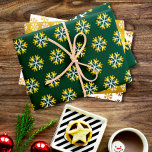 Simple modern holiday gold foil white snowflake wrapping paper sheet<br><div class="desc">A fun, playful, gold and white snowflake graphic pattern in three graphic sizes, on a rich dark green and faux gold foil textured backgrounds, helps you usher in the holiday season of Christmas and Hanukkah. Feel the warmth and joy of the holidays whenever you use this stunning, chic, modern, holiday...</div>