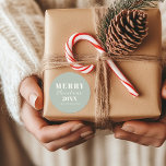 Simple Modern Merry Christmas Soft Green Classic Round Sticker<br><div class="desc">Give your gifts and holiday packaging a modern touch with this round sticker from the Modern Merry Christmas Script Collection. Featuring a soft modern farmhouse green background with ivory cream minimalist typography, the design reads Merry Christmas with customisable spaces for the year and a name. These festive holiday stickers are...</div>