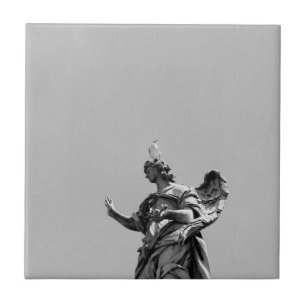 Simple, modern photo of seagull on top of statue ceramic tile