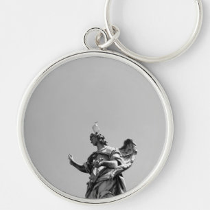 Simple, modern photo of seagull on top of statue key ring