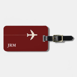 simple personalised dark-red travel aeroplane luggage tag