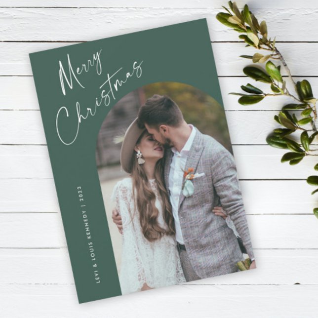 Simple Script Boho Arch Christmas Holiday Card (Simple script boho arch photo Christmas holiday card with modern elegant handwritten typography.)