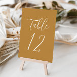 Simple Script Ochre Wedding Table Number<br><div class="desc">Elegant wedding table numbers featuring the table number displayed in a simple white script with an ochre background. The text and background colours can be changed to your wedding colours using the editing tools. To order these table cards, individually edit the card with the number and add it to your...</div>