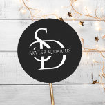 Simple Wedding Monogram Personalised With Name Classic Round Sticker<br><div class="desc">Add a personalised touch to your wedding with the Simple Wedding Monogram Personalised With Name Classic Round Sticker. These custom wedding monogram name stickers are perfect for sealing envelopes, decorating wedding favours, or adding a stylish element to your stationery. The elegant white and black design features the bride and groom’s...</div>