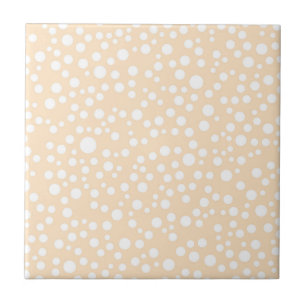 Simple white dotted pattern on peach background ceramic tile