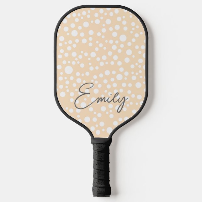 Simple white dotted pattern on peach background pickleball paddle (Front)