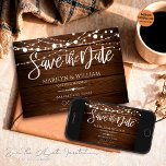 Simple Wood and String Lights Rustic Wedding Save The Date<br><div class="desc">Capture the essence of your love story and make announcing your big day memorable with these unique Rustic Wedding 'Save the Dates'. Featuring a simplistic wooden backdrop adorned with elegant string lights, these invitations evoke a warm, rustic charm. Stop stressing over your wedding save the dates! Our designs are handcrafted...</div>