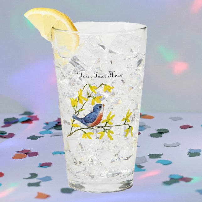 Singing Red Blue Bird on Branch Yellow Flowers Glass (Singing bird in red and blue on a branch with pretty yellow flowers on a glass drink tumbler.)