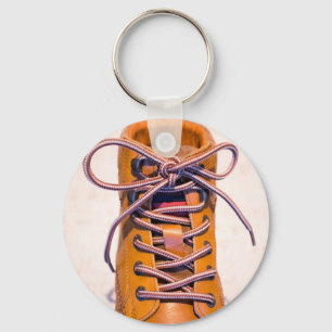 Single male shoe key ring