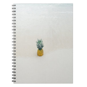 Single pineapple on the beach notebook