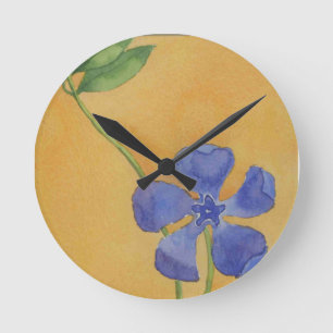 Single simple periwinkle on buff background round clock