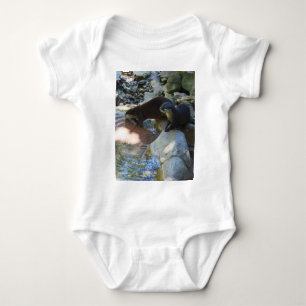 **"Sips by the Stream: Otters Drinking from River Baby Bodysuit