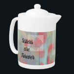 Sisters Forever Pink Rose Teal Victorian Floral<br><div class="desc">"Sisters are Forever" is the sentiment on this beautiful teapot featuring a lovely floral pattern. The flower pattern gives this teapot a Victorian touch with geometric squares and unique rose flowers in pink and teal colours. "Sisters are Forever" is featured on both sides of this special teapot and can easily...</div>