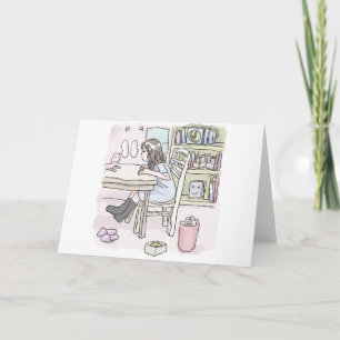 sit down at a desk in a small room holiday card