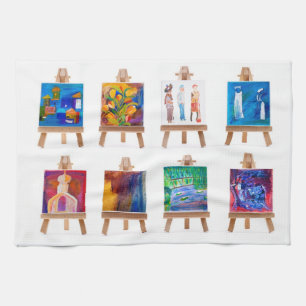 Six mini paintings on easels isolated on white tea towel