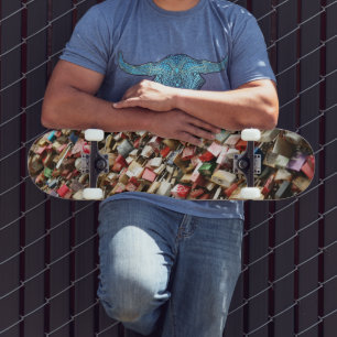 Skateboard covered with coloured locks design