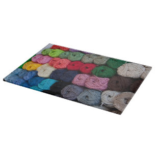 Skeins of yarn cutting board