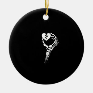 Skeleton Hand Holding Heart Ceramic Ornament