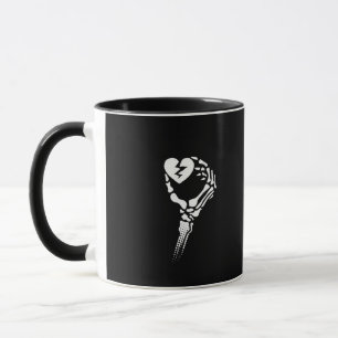 Skeleton Hand Holding Heart Mug