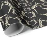 Skeleton Hands Heart Shape Goth Patterned Wrapping Paper<br><div class="desc">Add a creepy cool touch to your gifts with this wrapping paper. This goth patterned gift wrap features illustrations of skeleton hands in a heart shape. The graphics are in a cream or ivory colour set against a black background.</div>